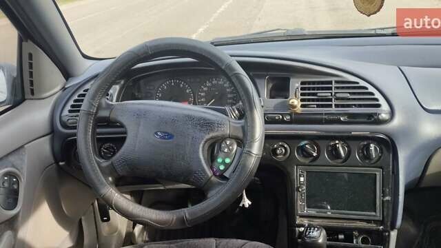 Синий Форд Мондео, объемом двигателя 1.8 л и пробегом 393 тыс. км за 1650 $, фото 10 на Automoto.ua