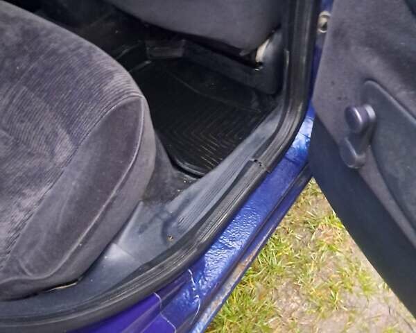 Синий Форд Мондео, объемом двигателя 1.8 л и пробегом 405 тыс. км за 1650 $, фото 9 на Automoto.ua