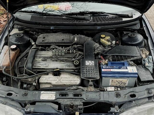 Синий Форд Мондео, объемом двигателя 1.8 л и пробегом 462 тыс. км за 1500 $, фото 7 на Automoto.ua