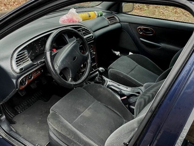 Синий Форд Мондео, объемом двигателя 1.8 л и пробегом 462 тыс. км за 1500 $, фото 4 на Automoto.ua