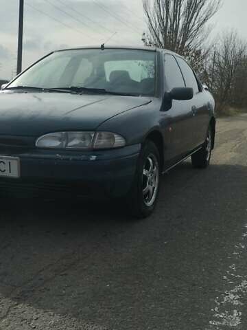 Синий Форд Мондео, объемом двигателя 1.8 л и пробегом 393 тыс. км за 1650 $, фото 7 на Automoto.ua