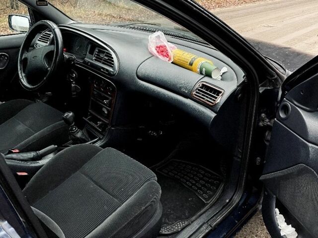 Синий Форд Мондео, объемом двигателя 1.8 л и пробегом 462 тыс. км за 1500 $, фото 5 на Automoto.ua