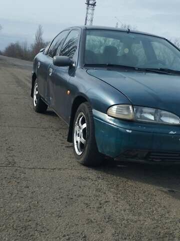 Синий Форд Мондео, объемом двигателя 1.8 л и пробегом 393 тыс. км за 1650 $, фото 8 на Automoto.ua