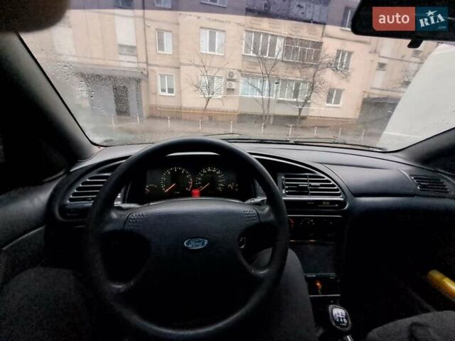 Синий Форд Мондео, объемом двигателя 1.8 л и пробегом 405 тыс. км за 1650 $, фото 14 на Automoto.ua