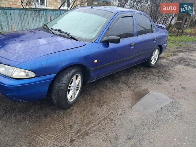 Синий Форд Мондео, объемом двигателя 1.8 л и пробегом 405 тыс. км за 1650 $, фото 3 на Automoto.ua