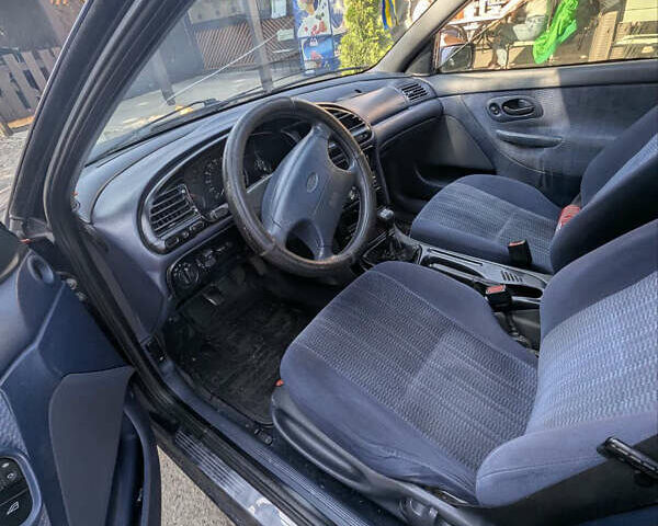 Синий Форд Мондео, объемом двигателя 1.8 л и пробегом 314 тыс. км за 1400 $, фото 1 на Automoto.ua