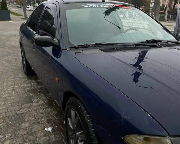 Синий Форд Мондео, объемом двигателя 1.8 л и пробегом 256 тыс. км за 1700 $, фото 5 на Automoto.ua