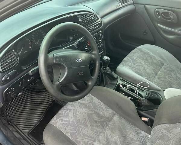 Синий Форд Мондео, объемом двигателя 1.8 л и пробегом 370 тыс. км за 1500 $, фото 8 на Automoto.ua