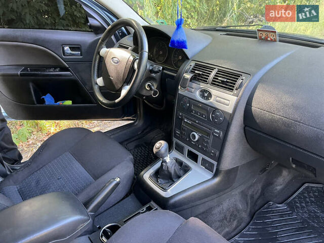 Синий Форд Мондео, объемом двигателя 2.2 л и пробегом 290 тыс. км за 3800 $, фото 18 на Automoto.ua