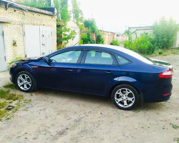 Синій Форд Мондео, об'ємом двигуна 1.8 л та пробігом 228 тис. км за 7000 $, фото 21 на Automoto.ua