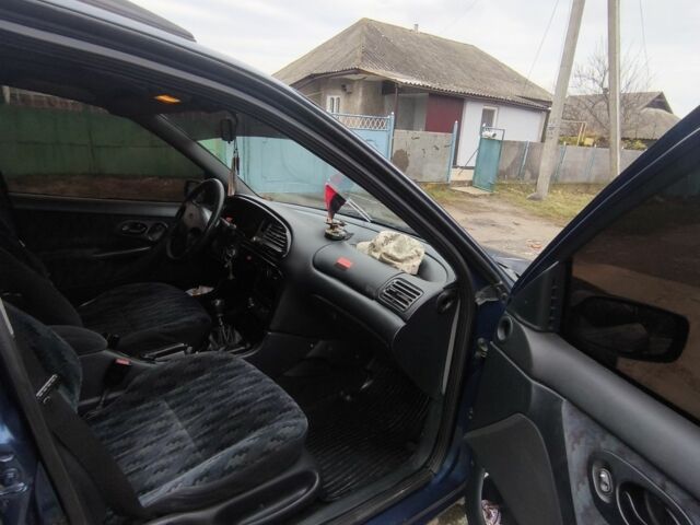 Синий Форд Мондео, объемом двигателя 1.8 л и пробегом 77 тыс. км за 1200 $, фото 7 на Automoto.ua