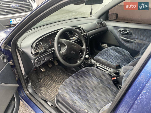 Синий Форд Мондео, объемом двигателя 1.8 л и пробегом 400 тыс. км за 1000 $, фото 5 на Automoto.ua