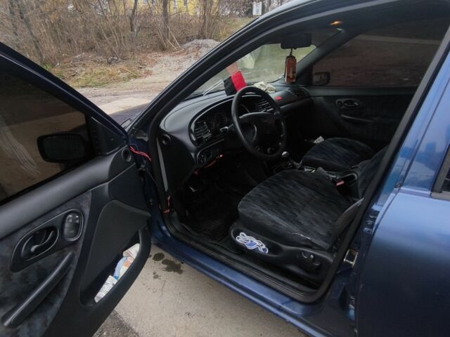 Синий Форд Мондео, объемом двигателя 1.8 л и пробегом 77 тыс. км за 1200 $, фото 6 на Automoto.ua