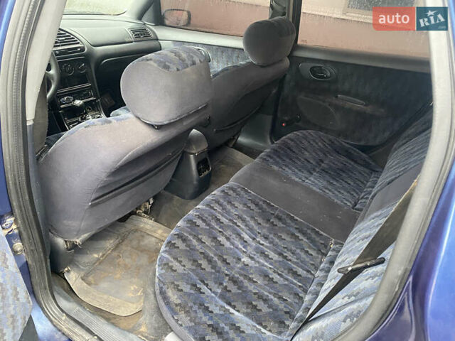 Синий Форд Мондео, объемом двигателя 1.8 л и пробегом 400 тыс. км за 1000 $, фото 8 на Automoto.ua