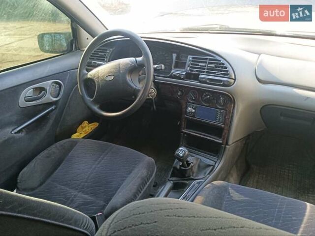 Синий Форд Мондео, объемом двигателя 1.8 л и пробегом 300 тыс. км за 999 $, фото 7 на Automoto.ua