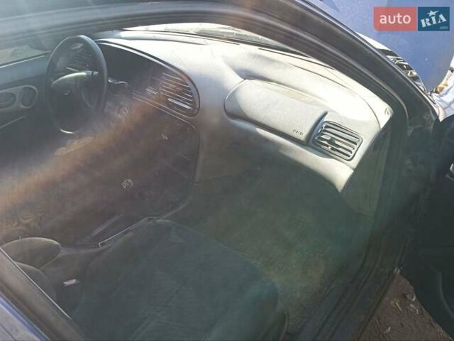 Синий Форд Мондео, объемом двигателя 1.8 л и пробегом 300 тыс. км за 999 $, фото 1 на Automoto.ua