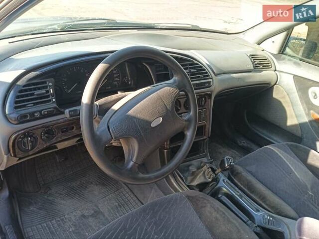 Синий Форд Мондео, объемом двигателя 1.8 л и пробегом 300 тыс. км за 999 $, фото 4 на Automoto.ua