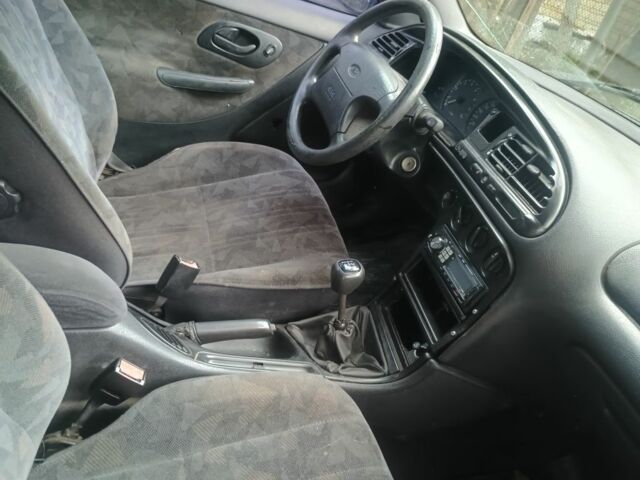 Синий Форд Мондео, объемом двигателя 1.8 л и пробегом 333 тыс. км за 1300 $, фото 6 на Automoto.ua