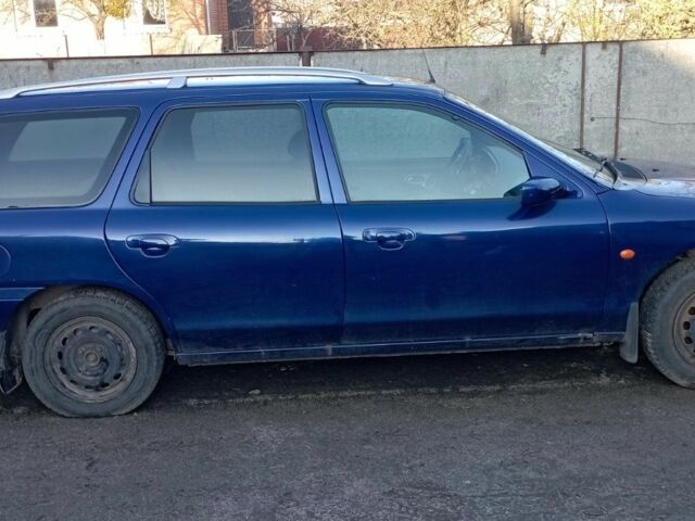 Синий Форд Мондео, объемом двигателя 1.8 л и пробегом 500 тыс. км за 900 $, фото 1 на Automoto.ua