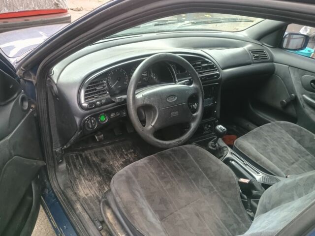 Синий Форд Мондео, объемом двигателя 1.8 л и пробегом 333 тыс. км за 1300 $, фото 7 на Automoto.ua