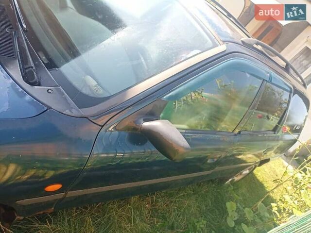 Синий Форд Мондео, объемом двигателя 1.6 л и пробегом 790 тыс. км за 1500 $, фото 3 на Automoto.ua