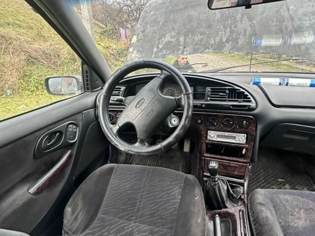 Синий Форд Мондео, объемом двигателя 1.8 л и пробегом 15 тыс. км за 800 $, фото 2 на Automoto.ua