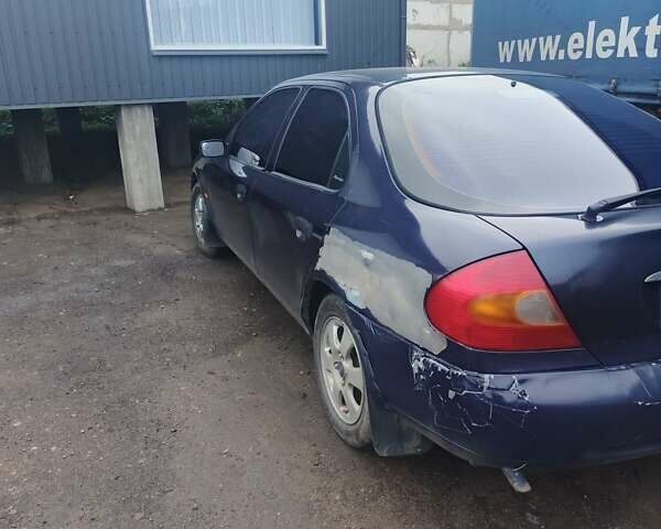 Синій Форд Мондео, об'ємом двигуна 1.8 л та пробігом 287 тис. км за 1300 $, фото 4 на Automoto.ua