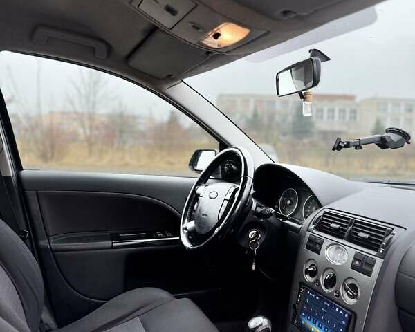 Синий Форд Мондео, объемом двигателя 2 л и пробегом 320 тыс. км за 3899 $, фото 28 на Automoto.ua