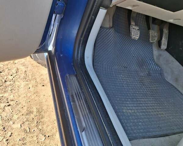 Синій Форд Мондео, об'ємом двигуна 2 л та пробігом 187 тис. км за 3999 $, фото 11 на Automoto.ua