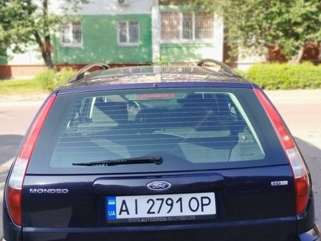 Синій Форд Мондео, об'ємом двигуна 2 л та пробігом 279 тис. км за 4800 $, фото 1 на Automoto.ua
