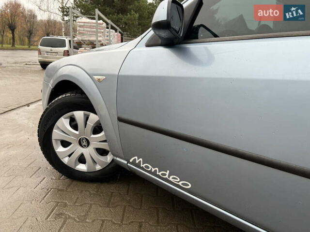 Синий Форд Мондео, объемом двигателя 2 л и пробегом 300 тыс. км за 2399 $, фото 4 на Automoto.ua