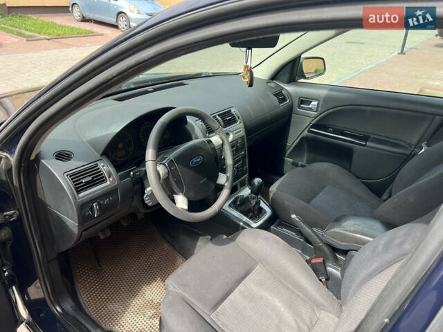 Синий Форд Мондео, объемом двигателя 2 л и пробегом 320 тыс. км за 2450 $, фото 11 на Automoto.ua