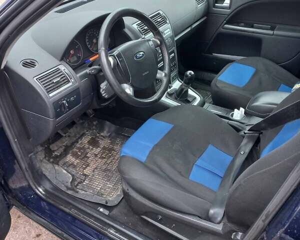 Синій Форд Мондео, об'ємом двигуна 2 л та пробігом 214 тис. км за 3900 $, фото 4 на Automoto.ua