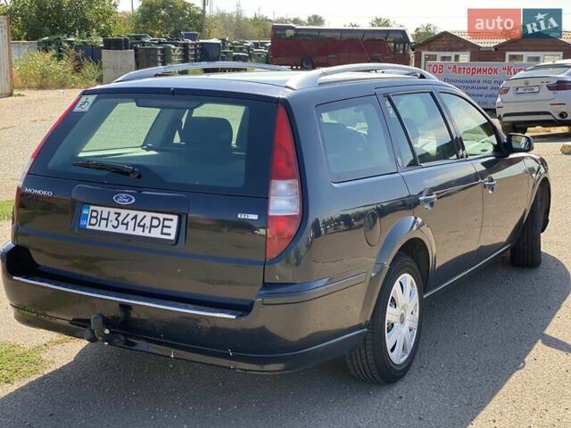 Синий Форд Мондео, объемом двигателя 2 л и пробегом 230 тыс. км за 5800 $, фото 5 на Automoto.ua