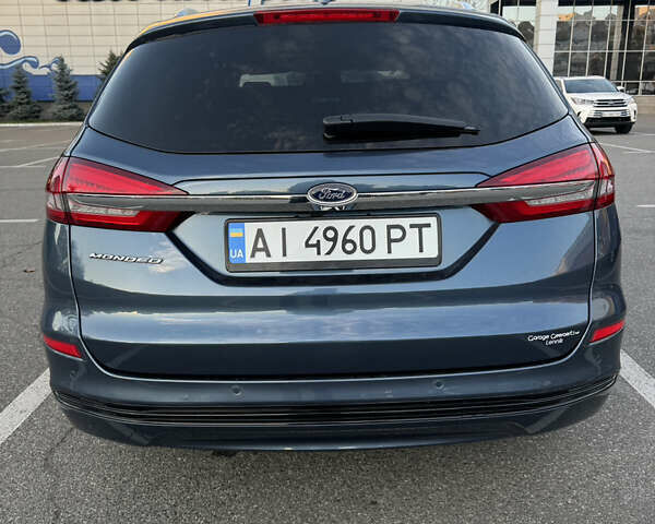 Синий Форд Мондео, объемом двигателя 2 л и пробегом 64 тыс. км за 18500 $, фото 5 на Automoto.ua