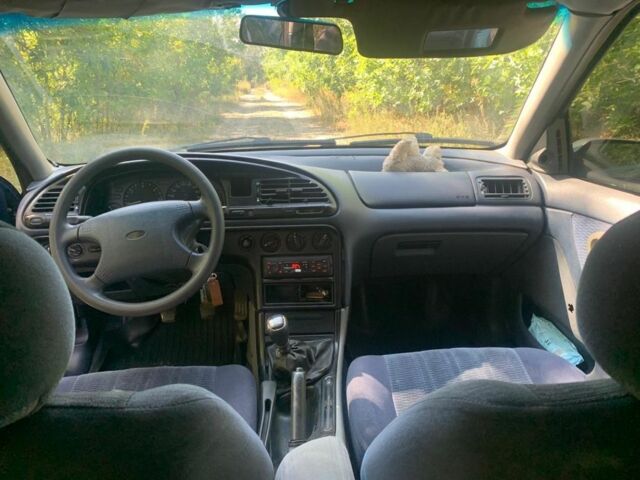 Синий Форд Мондео, объемом двигателя 1.8 л и пробегом 450 тыс. км за 1800 $, фото 6 на Automoto.ua