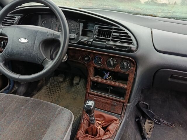 Зеленый Форд Мондео, объемом двигателя 1.8 л и пробегом 280 тыс. км за 600 $, фото 2 на Automoto.ua