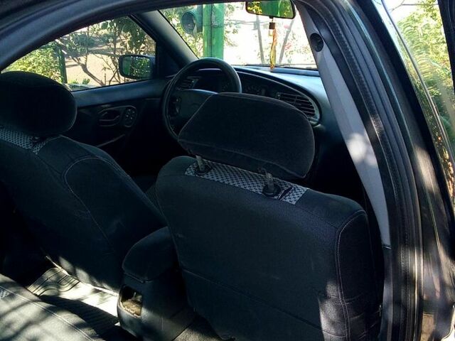 Зелений Форд Мондео, об'ємом двигуна 2 л та пробігом 353 тис. км за 1500 $, фото 5 на Automoto.ua