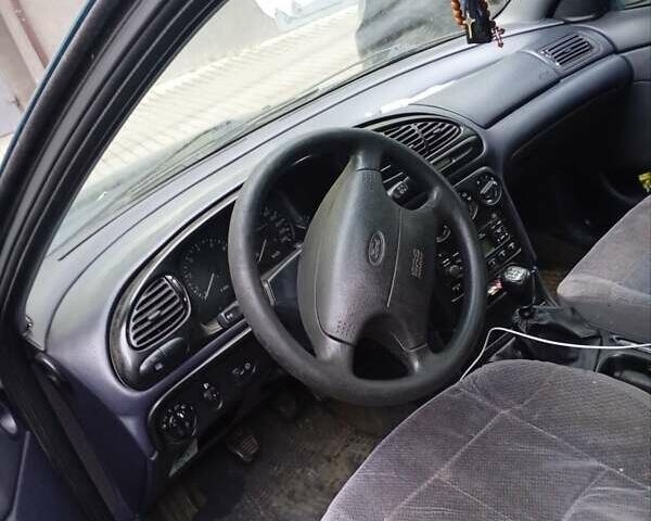 Зеленый Форд Мондео, объемом двигателя 1.8 л и пробегом 280 тыс. км за 1200 $, фото 7 на Automoto.ua