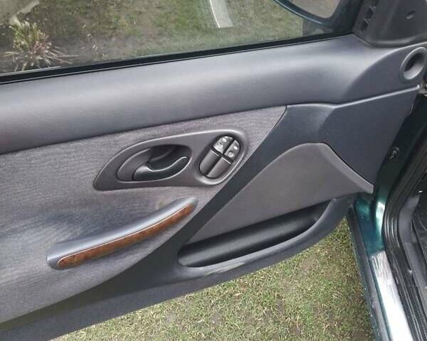 Зеленый Форд Мондео, объемом двигателя 1.8 л и пробегом 300 тыс. км за 2250 $, фото 10 на Automoto.ua