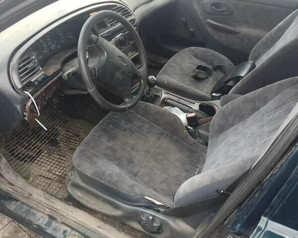 Зеленый Форд Мондео, объемом двигателя 1.6 л и пробегом 300 тыс. км за 1000 $, фото 3 на Automoto.ua