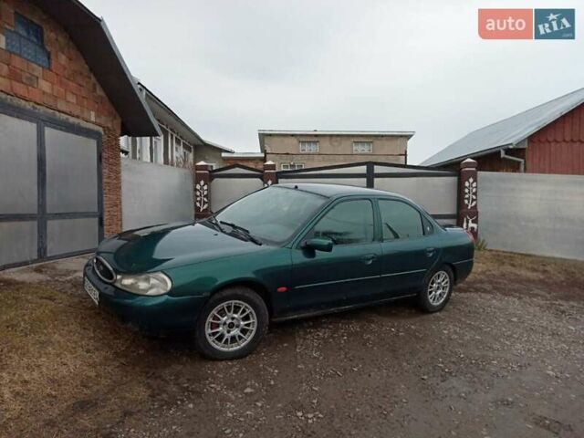 Зеленый Форд Мондео, объемом двигателя 1.8 л и пробегом 300 тыс. км за 2250 $, фото 5 на Automoto.ua