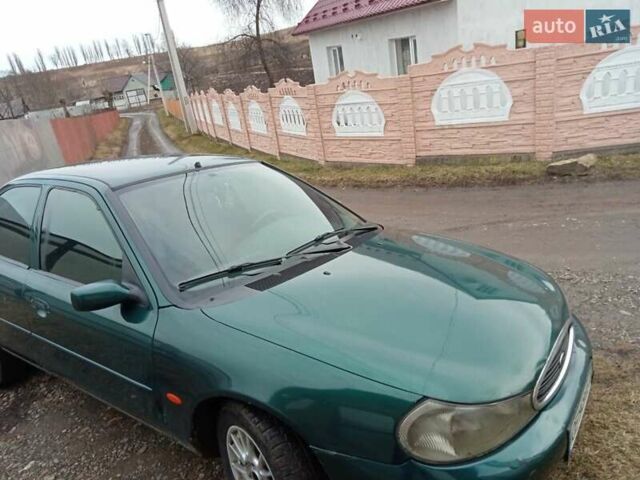 Зеленый Форд Мондео, объемом двигателя 1.8 л и пробегом 300 тыс. км за 2250 $, фото 1 на Automoto.ua