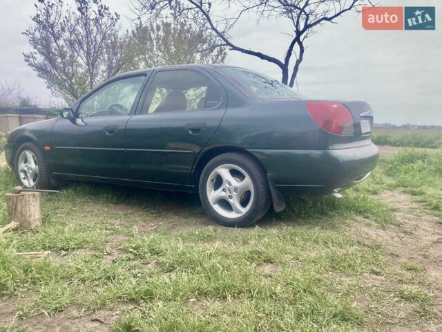 Зеленый Форд Мондео, объемом двигателя 1.8 л и пробегом 440 тыс. км за 3000 $, фото 1 на Automoto.ua