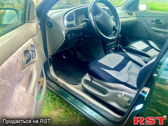 Зеленый Форд Мондео, объемом двигателя 1.8 л и пробегом 430 тыс. км за 3000 $, фото 2 на Automoto.ua