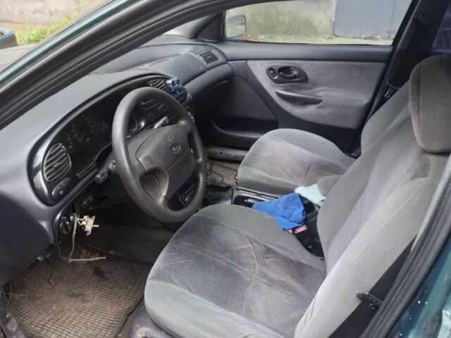 Зелений Форд Мондео, об'ємом двигуна 1.8 л та пробігом 280 тис. км за 1000 $, фото 7 на Automoto.ua