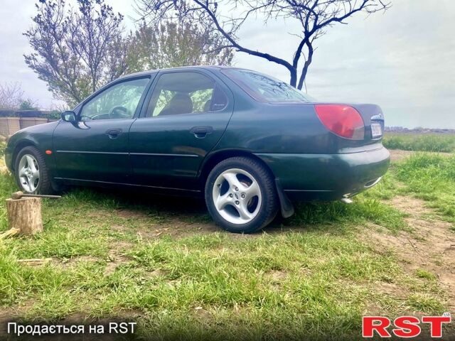 Зеленый Форд Мондео, объемом двигателя 1.8 л и пробегом 430 тыс. км за 3000 $, фото 1 на Automoto.ua