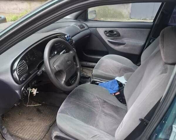 Зеленый Форд Мондео, объемом двигателя 1.8 л и пробегом 280 тыс. км за 1000 $, фото 5 на Automoto.ua