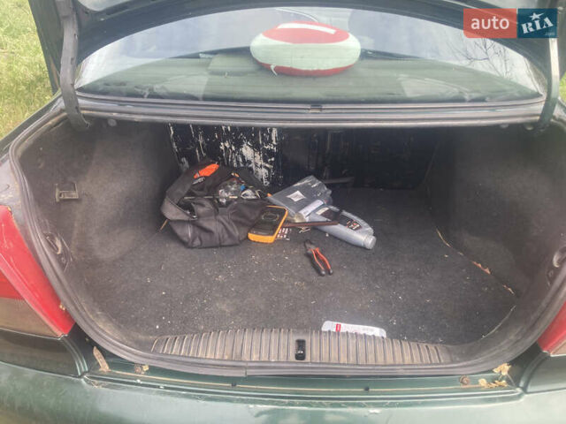 Зеленый Форд Мондео, объемом двигателя 1.8 л и пробегом 440 тыс. км за 3000 $, фото 8 на Automoto.ua