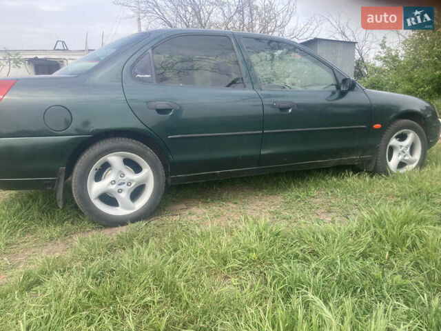 Зеленый Форд Мондео, объемом двигателя 1.8 л и пробегом 440 тыс. км за 3000 $, фото 6 на Automoto.ua